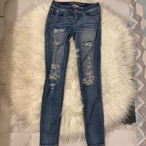 AE super stretch skinny jeans low rise size 4